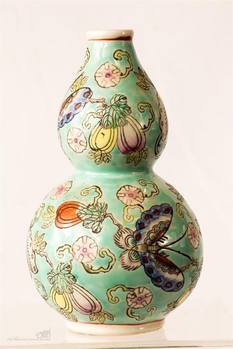 A Chinese porcelain gourd vase, with turquoise ground.