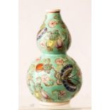 A Chinese porcelain gourd vase, with turquoise ground.
