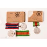 Two boxed WWII pair and Defence medal.