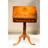 A Georgian mahogany table/book rest, the top with ratcheted height adjustable stand above a single
