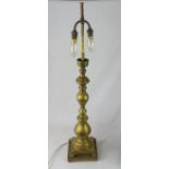 A twin light brass lamp, possibly American.