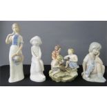 A Spode Joanna, a porcelain figure group and two Lladro style figures. (4)