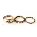 Three silver rings, one with three pastes stones size R.