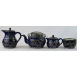 A Chinese ceramic and pewter tea set, circa 1920s, comprising teapot, hot water pot, cream and sugar