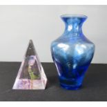 A Caithness Glass pyramid paperweight, together with a blue glass vase.