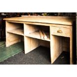 A large antique pine shop counter, with till drawer, and various compartments.
