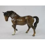 A Beswick figure of a pony.