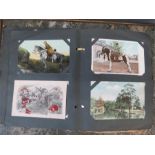 A postcard album including Regimental postcards, Naval postcards, etc.