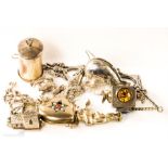 A group of silver charms to include donkey, church, keys, guitar etc, together with a pair of silver