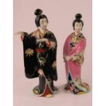 A pair of Chinese porcelain figures, Geisha girls.