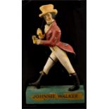 A Jonnie Walker advertising figure.