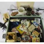 A group of military collectables to include aircraft clock, military stop watch, military pocket