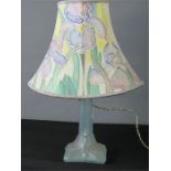 A French glass table lamp, the blue pressed glass depicting butterflies.