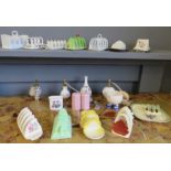 A quantity of ceramic toast racks of various design and other ceramics.