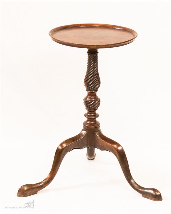 A mahogany George III kettle stand, with carved twist base.