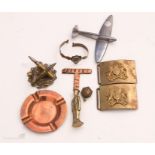 A group of trench art, military buckles etc.