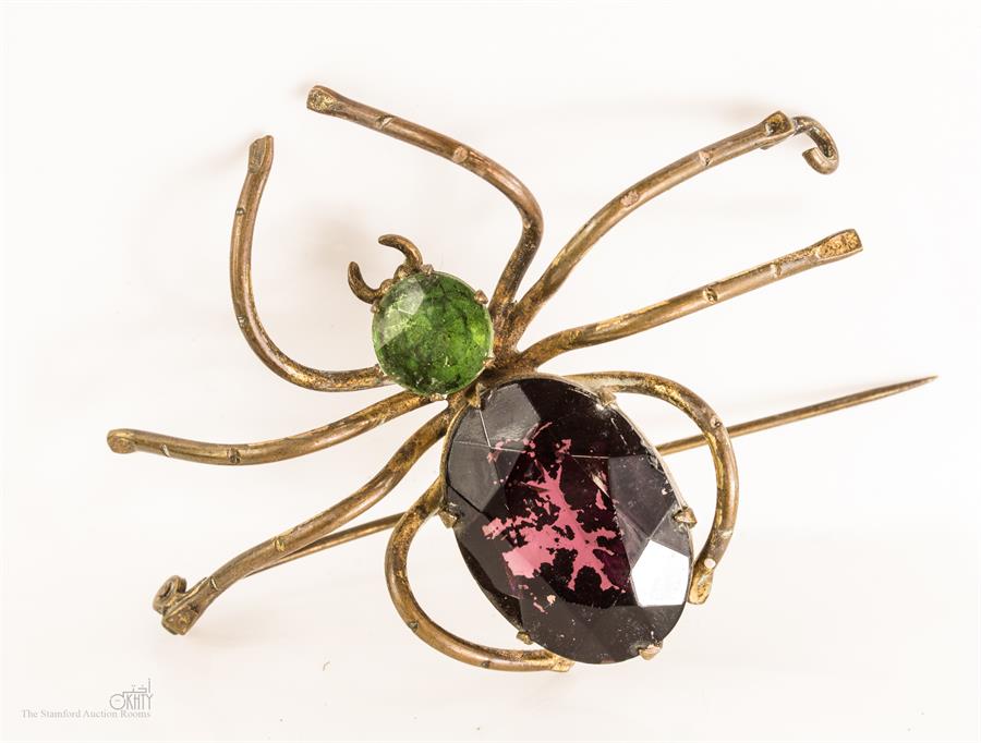 A spider dress brooch.