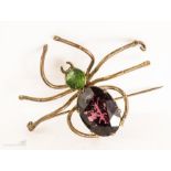 A spider dress brooch.