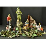 A group of military figurines, some hand painted, some Brittains toy soldiers etc.