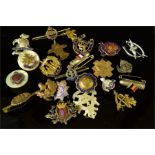 A large selection of military regimental sweetheart badges, to include RAF, Notts & Derby etc.