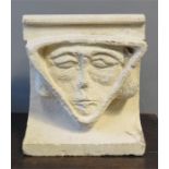 A reconstituted stone carved head, 20 by 15cm.