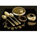 A group of silver including two silver spoons, a New Zealand brooch, necklace, wine coaster, bangle,