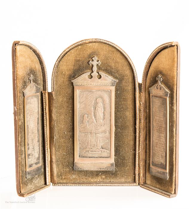 A 19th century French engraved metal triptych, each panel mounted to the three-part case.