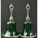 A pair of green glass bells, 25cm high.