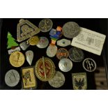 A selection of German tinnie badges.
