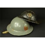 Two WWII Fire Brigade helmets, NFS and Lancashire County Fire Brigade.