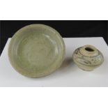 An early Chinese celedon dish, 11cm diameter and pot 6cm diameter.