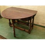 An oak gateleg table, bobbin turned legs, 73 by 103cm (leaves down)