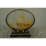 A Chinese glass case with interior cork carved landscape, 37cm by 38cm.