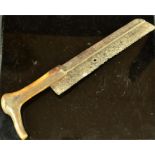 An early bone handled hand saw.