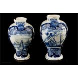 A pair of 18th century Delft vases.