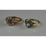 A 9ct gold ring, flowerhead, 3.3g, and a silver gilt dress flowerhead ring.