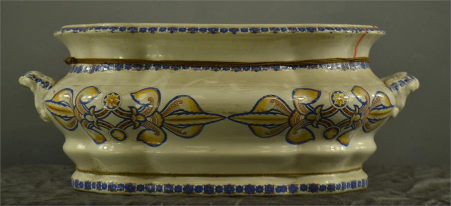 A large Victorian ceramic foot bath, 59 by 23cm.