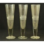 Three glasses etched with early sailing clipper.