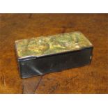 A 19th century papier mache snuff box depicting hares.