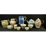 A large group of early ceramics including Chinese blue and white, and polychrome tea pot, tankard