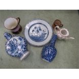 A group of ceramics including a blue and white moon flask, bottle vase, Delft charger, Victorian