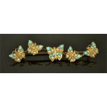 A 15ct gold, turquoise and seed pearl butterfly brooch, the five graduated butterflies on a bar