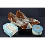 A Coty Vintage Airspun Parfum, Paris powder, and a pair of ladies Vintage faux suede wedge shoes.