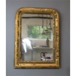 A giltwood wall mirror.