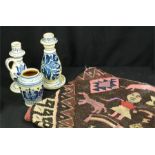 Three blue and white Hungarian jars, an agate match striker and a kilim cushion cover.