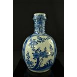 An early 19th century blue and white bottle vase, 26cm high.