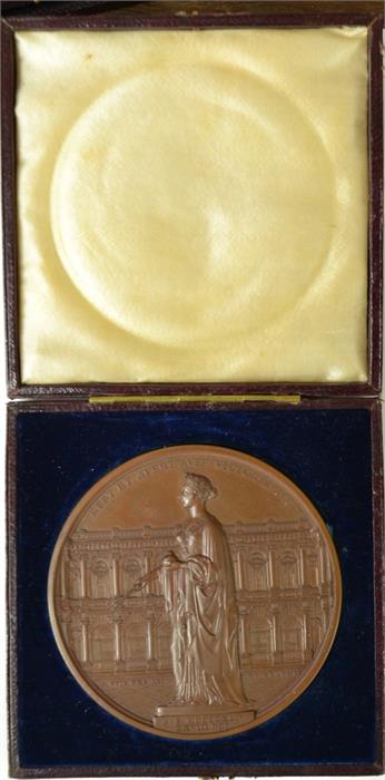 A bronze commemorative medallion, in original box.