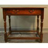 An 18th century oak side table, with single drawer, turned legs and peripheral stretchers, 80 by