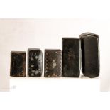 A group of five 19th century papier mache snuff boxes.