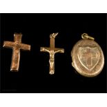 Two 9ct gold crucifixes, and a 9ct gold locket front.